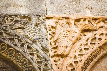 Patterns and signs of animals on old buildings in Ani archeological site in Turkey