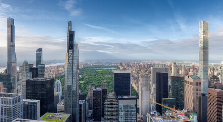 The New York City skyline and the Central Park and skyscraper aerial at sunset, Manhattan, NY, USA