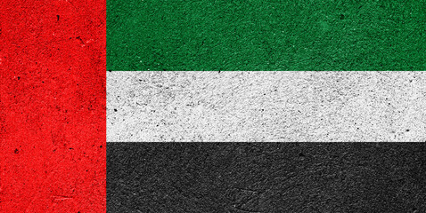 Flag of United Arab Emirates on a plastered wall
