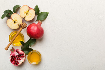 Flat lay composition with symbols jewish Rosh Hashanah holiday attributes on colored background, Rosh hashanah concept. New Year holiday Traditional. Top view with copy space
