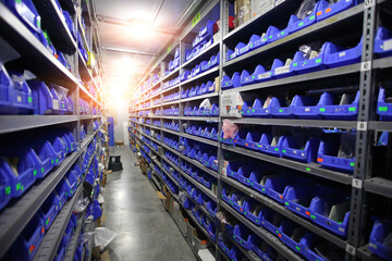 Warehouse store stock. Industrial warehouse. Warehouse of a trade organization. Goods and materials arranged on a rack in warehouse.