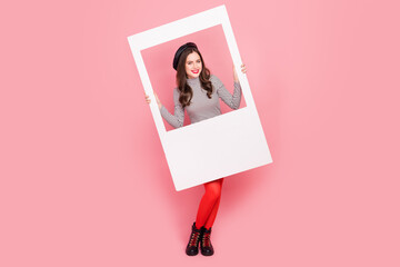 Photo of stylish trendy lady hold picture frame make shot on shopping sales isolated pastel color...