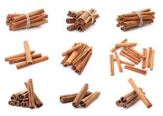 Set with aromatic cinnamon sticks on white background