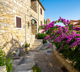 Fototapeta na wymiar charming cobblestone street in old town of Omis in Dalmatia in Croatia