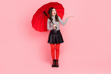Full body photo of stylish lady european hold parasol palm try rain drop climate isolated pastel...