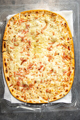 savory pie Flammkuchen bacon, onion, sour cream delicious pastries fresh meal food snack on the...