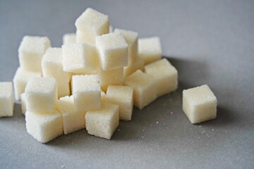 Almaty, Kazakhstan - 03.28.2022 : Sugar cubes are laid out on the kitchen table
