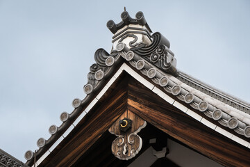 Detailed roof ornamentation, Kyoto's Imperial Palace, Japan. Historic traditional Japanese architecture.
