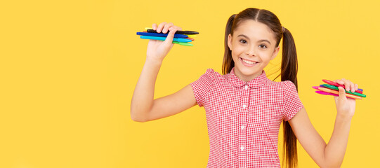 smiling child ready to draw picture. office supplies for school. stationery for painting. Portrait...