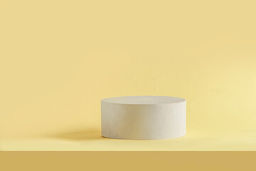 Modern product display with podium at yellow background. Minimal scene stage showcase for your product. Front view with copy space.