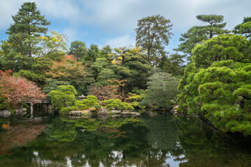 Fototapeta na wymiar Gonaitei garden on beautiful autumn day in Kyoto Imperial palace in Kyoto, Japan. Oike-niwa - serene japanese zen garden and pond