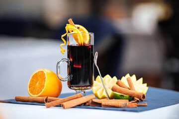 Portion of gourmet mulled wine with cinnamon and orange