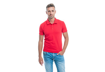 handsome man with grizzled hair in red shirt standing isolated on white background