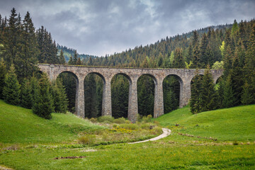 Fototapeta na wymiar The Chmaros viaduct, stone railway bridge near of The Telgart town in central Slovakia, Europe.