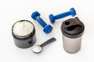 Jar with whey protein and dumbbells. Sports nutrition and food supplement