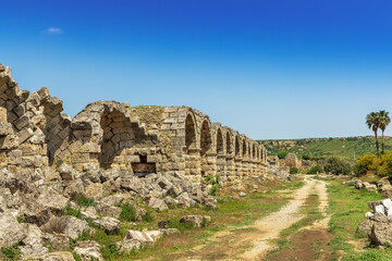 Arches of stadium outer wall built in 2nd century AD in Perge, an ancient Greek city in Anatolia, now in Antalya Province of Turkey.