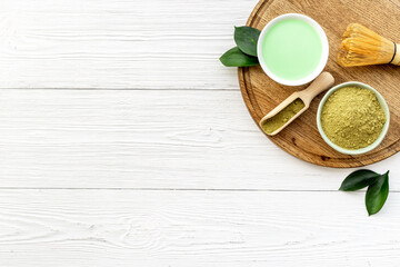 Fototapeta na wymiar Matcha tea powder with green hot drink - asian tea ceremony