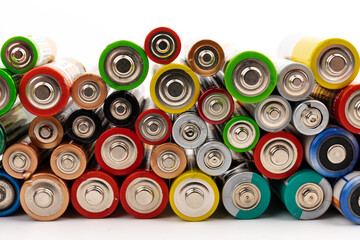 Composition with alkaline batteries on white background. Chemical waste. Top view.