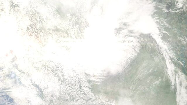 Earth zoom in from outer space to city. Zooming on St. Albert, Alberta, Canada. The animation continues by zoom out through clouds and atmosphere into space. Images from NASA