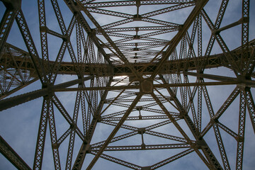 old cast iron and riveted train bridge in northern argentina