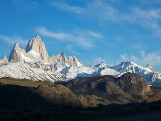 Foto op Plexiglas Cerro Chaltén Beautiful view of the sunrise reflected in the majestic Fitz Roy in the Andes of Patagonia