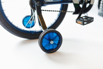 training wheels of kids bike with, close-up view