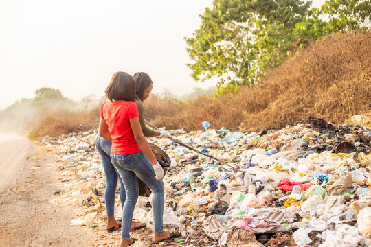 Attractive Voluntary Female Workers Cleaning Up Rural Environment Against Waste Pollution