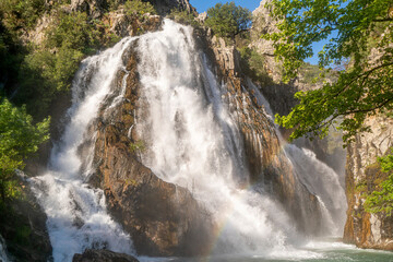 Fototapeta premium Uçansu (cündüre)Waterfall, which is born in Gündoğmuş district at the summit of the Taurus Mountains and is approximately 50 m high, is known as the ‘hidden paradise in the forest.’