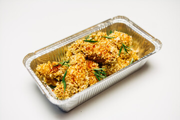 Nuggets in a thermal box on a white background