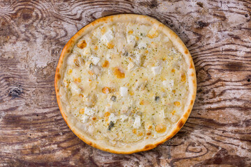 Pizza with different types of cheese