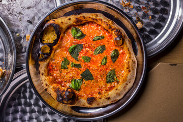 Pizza with cheese and basil
