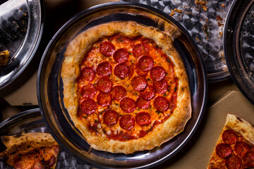 Pizza with cheese and pepperoni