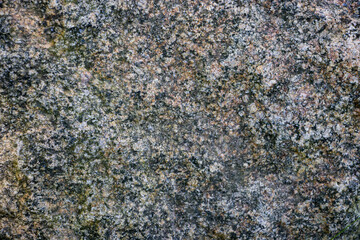 Texture of granite stone. Background of natural granite stone. Granite raw surface. selective focus
