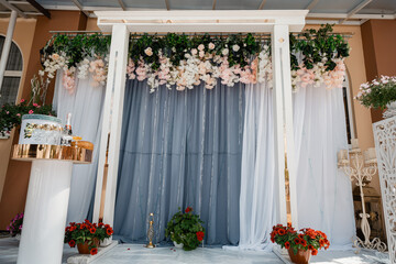 balcony with flowers and windows