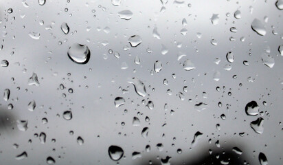 Water droplets on the glass close-up. Background.