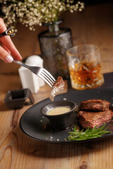 Gourmet meat meals assortment flat lay. Top view on restaurant table with menu of tasty grilled snacks. Concept for restaurant menu.