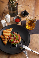 Gourmet meat meals assortment flat lay. Top view on restaurant table with menu of tasty grilled snacks. Concept for restaurant menu.