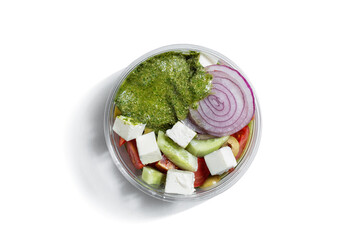 Mozzarella with cucumbers, tomatoes, onions and pesto sauce