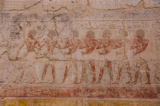 Luxor, Egypt - November 13, 2020: Ancient Egyptian Drawing on the Walls of Mortuary Temple of Hatshepsut