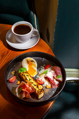 Pumpkin porridge with strawberries, apple, mint, avocado