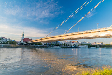 Sunset view National Uprising bridge over Danube river in Bratislava, Slovakia.