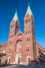 Fototapeta na wymiar Maribor, Slovenia - June 2, 2022: The Franciscan Church of St Mary Mother of Mercy (Slovene: bazilika Matere Usmiljenja).