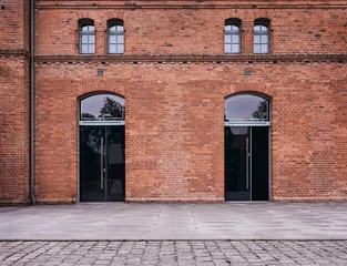 Crédence de cuisine en verre imprimé Mur de briques Industrial background, empty grunge urban street with warehouse brick wall