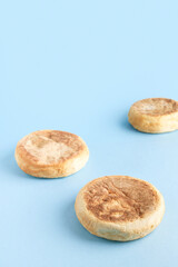 Bolo de caco. Traditional portuguese bread on blue a background