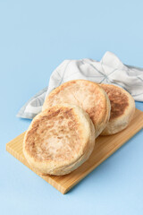 Bolo de caco. Traditional portuguese bread on blue a background