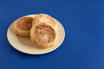 Bolo de caco. Traditional portuguese bread on blue a background
