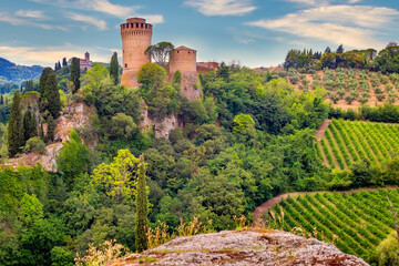 Brisighella, Ravenna, Emilia-Romagna, Italy, Ravenna, Emilia-Romagna, Italy. Beautiful panoramic aerial view of the medieval city and Manfredian fortress with clock tower. Famous symbols - obrazy, fototapety, plakaty