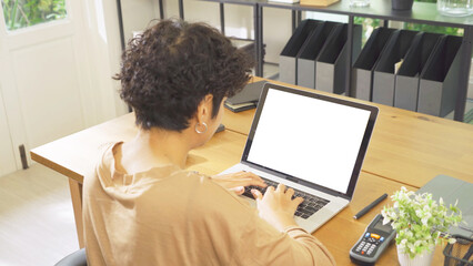 Business black african american woman, person working from home on table with computer notebook...