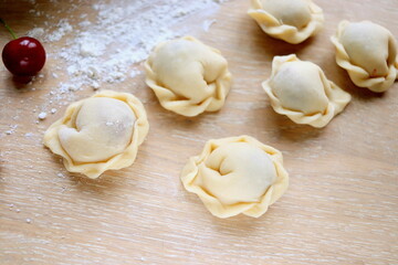 delicious sweet dumplings with cherries  close-up on the table selective focus
