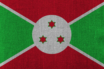 Patriotic classic denim background in colors of national flag. Burundi